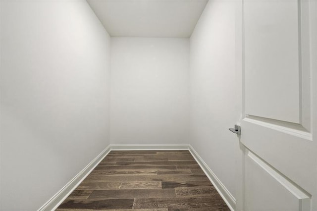 unfurnished room with dark hardwood / wood-style floors