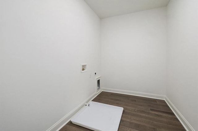 laundry area featuring dark wood-type flooring, hookup for an electric dryer, and washer hookup