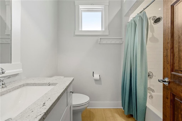 full bathroom featuring vanity, shower / bathtub combination with curtain, and toilet