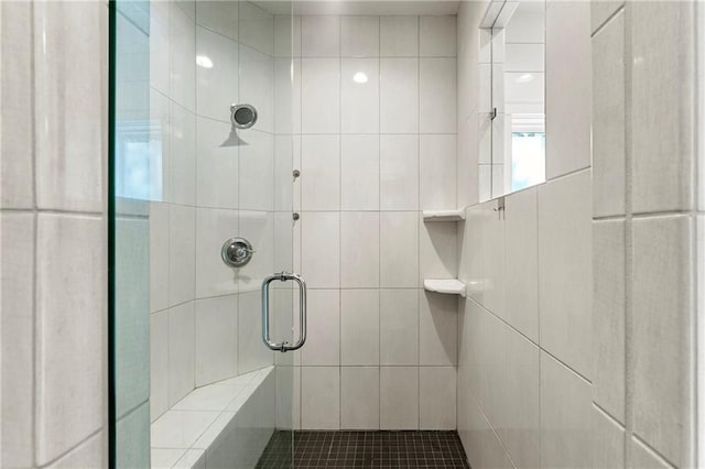 bathroom with an enclosed shower