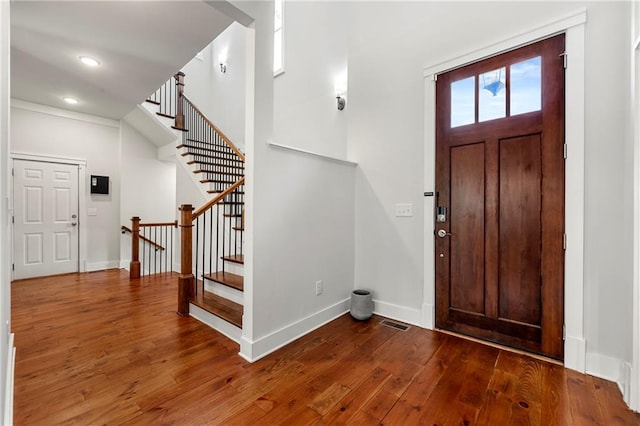 entrance foyer featuring hardwood / wood-style flooring