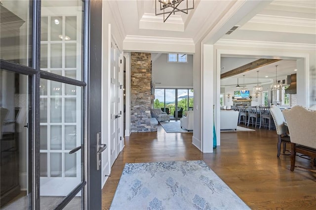 kitchen with light stone counters, white cabinetry, custom range hood, tasteful backsplash, and premium range