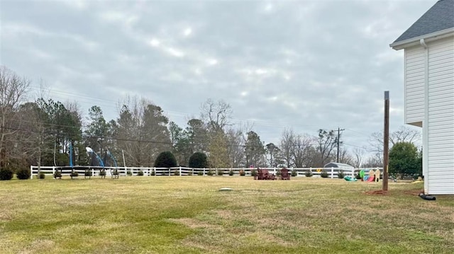 surrounding community featuring a lawn