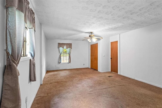 900 Fleetwood Cir, Atlanta, GA 30311 - carpeted spare room with ceiling fan, a textured ceiling, and baseboards
