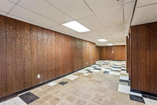 900 Fleetwood Cir, Atlanta, GA 30311 - finished basement featuring light floors, a drop ceiling, and wood walls
