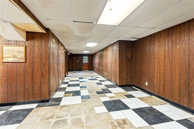 900 Fleetwood Cir, Atlanta, GA 30311 - hall with wooden walls, a paneled ceiling, and light flooring
