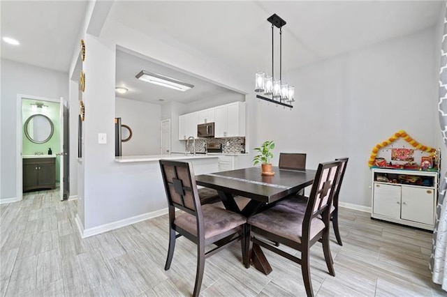 545 Windstone Trl, Alpharetta, GA 30004 - dining area featuring baseboards, light wood-type flooring, and recessed lighting