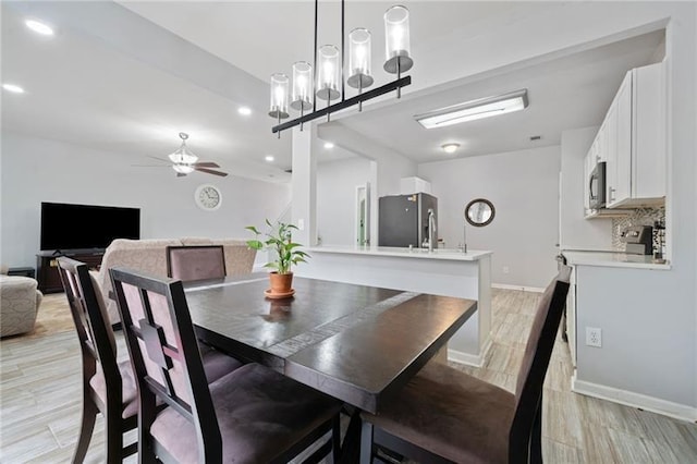 545 Windstone Trl, Alpharetta, GA 30004 - dining space featuring a ceiling fan, baseboards, light wood finished floors, and recessed lighting