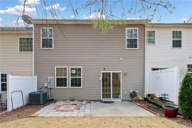 545 Windstone Trl, Alpharetta, GA 30004 - rear view of property with central air condition unit and a patio