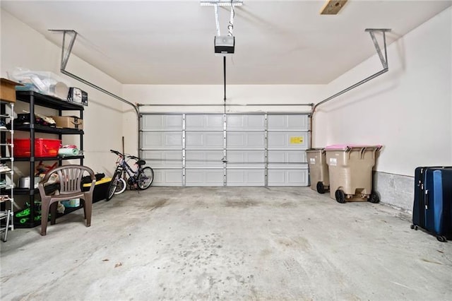 545 Windstone Trl, Alpharetta, GA 30004 - garage featuring a garage door opener