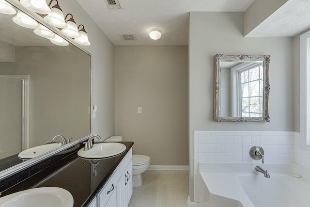 41 Pebble Ct, Hoschton, GA 30548 - bathroom featuring a sink, a bath, and visible vents