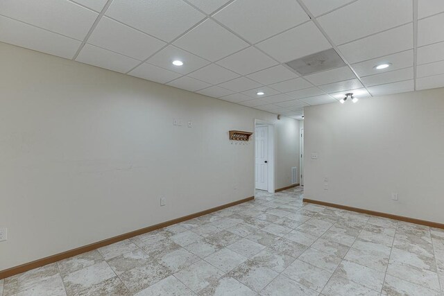 41 Pebble Ct, Hoschton, GA 30548 - empty room with baseboards, recessed lighting, and a paneled ceiling