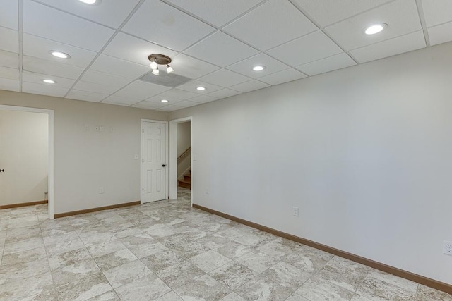 41 Pebble Ct, Hoschton, GA 30548 - spare room featuring baseboards, stairs, a paneled ceiling, and recessed lighting