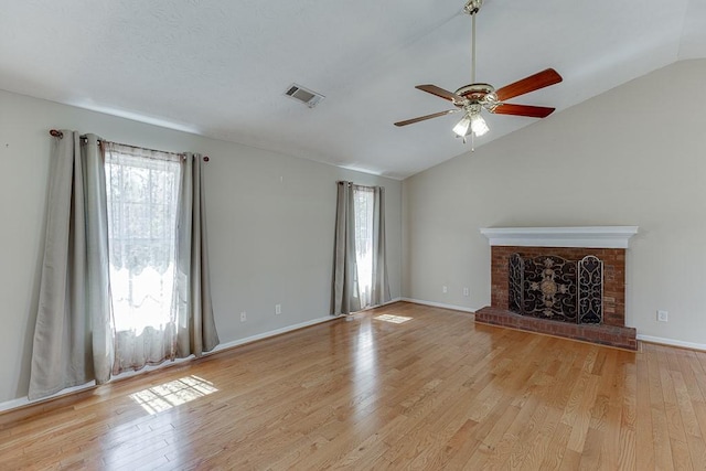 41 Pebble Ct, Hoschton, GA 30548 - unfurnished living room with ceiling fan, visible vents, light wood finished floors, and plenty of natural light