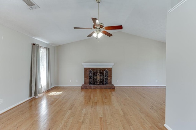 41 Pebble Ct, Hoschton, GA 30548 - unfurnished living room with lofted ceiling, baseboards, visible vents, light wood-style flooring, and ceiling fan