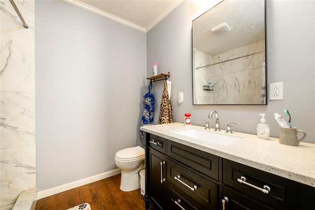 bathroom with walk in shower, toilet, wood-type flooring, crown molding, and vanity