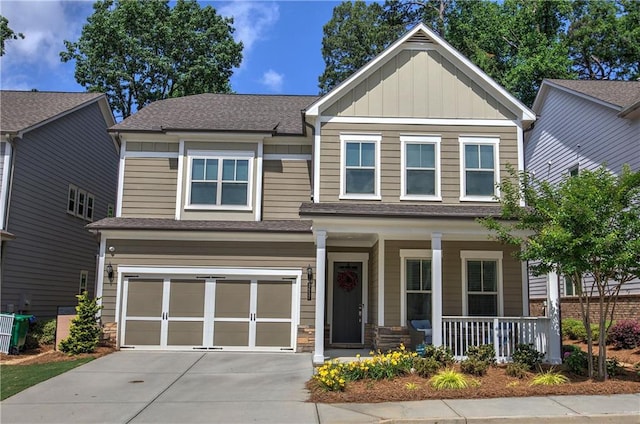 2657 Cedar Pine Way, Atlanta, GA 30360 - craftsman house with covered porch, board and batten siding, concrete driveway, a garage, and a shingled roof