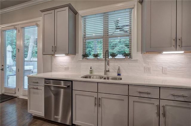 2657 Cedar Pine Way, Atlanta, GA 30360 - kitchen with stainless steel dishwasher, a sink, tasteful backsplash, crown molding, and dark wood-type flooring