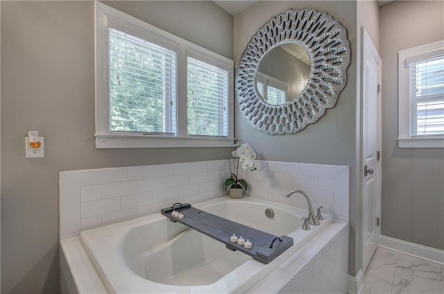 2657 Cedar Pine Way, Atlanta, GA 30360 - full bathroom with marble look tiles, baseboards, and a bath