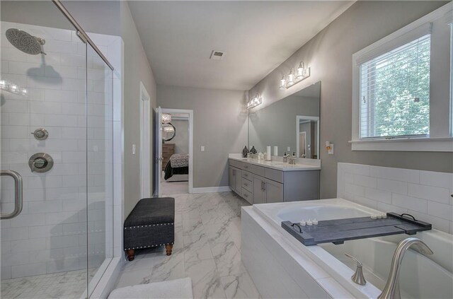 2657 Cedar Pine Way, Atlanta, GA 30360 - ensuite bathroom featuring a shower stall, a garden tub, vanity, and marble finish floors