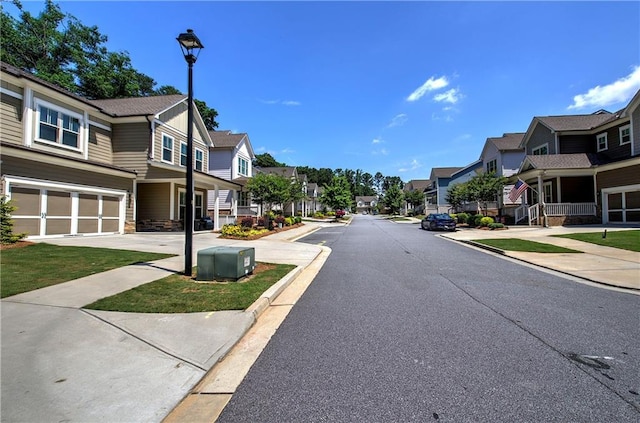 2657 Cedar Pine Way, Atlanta, GA 30360 - view of asphalt street featuring a residential view, street lighting, curbs, and sidewalks