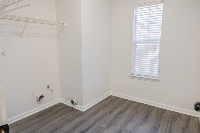 empty room featuring dark hardwood / wood-style flooring