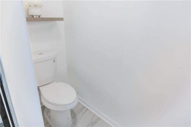 bathroom featuring toilet