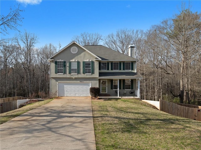 view of front of house featuring a garage, a porch, and a front lawn