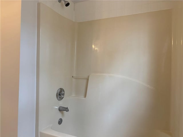 bathroom with shower / bathtub combination