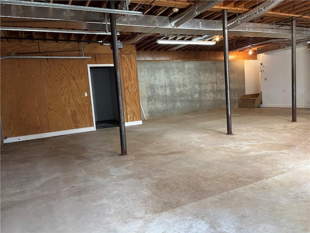 unfinished basement with stairs