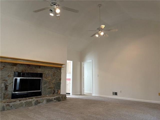 unfurnished living room featuring carpet floors, visible vents, baseboards, and a ceiling fan