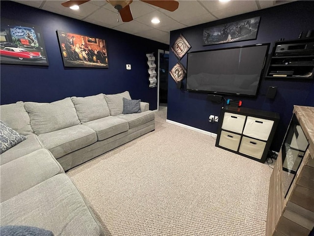655 Chester Harris Dr, Dallas, GA 30132 - carpeted living room featuring a ceiling fan, baseboards, and a paneled ceiling