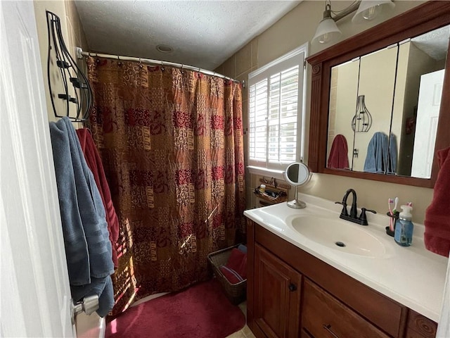 655 Chester Harris Dr, Dallas, GA 30132 - full bath featuring vanity, a textured ceiling, and a shower with curtain