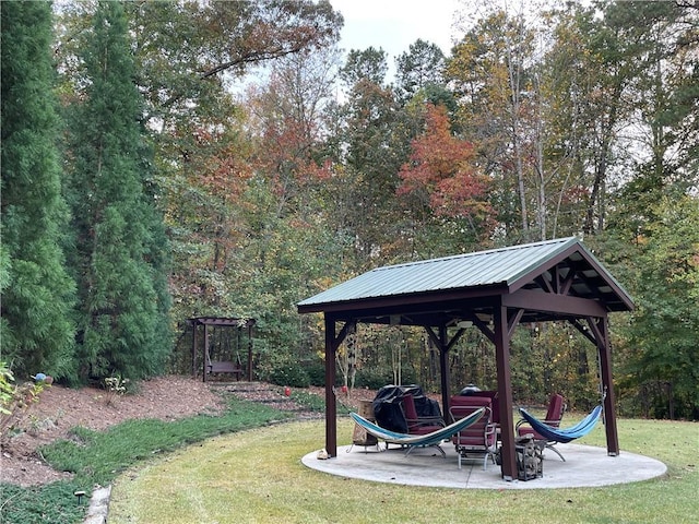 655 Chester Harris Dr, Dallas, GA 30132 - view of grassy yard featuring a gazebo and a patio area