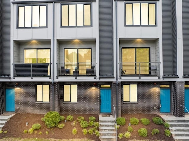 701 Pryor St SW Unit 5, Atlanta, GA 30315 - back of house with brick siding and a balcony