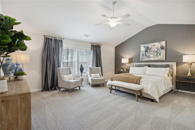 carpeted bedroom featuring ceiling fan and lofted ceiling