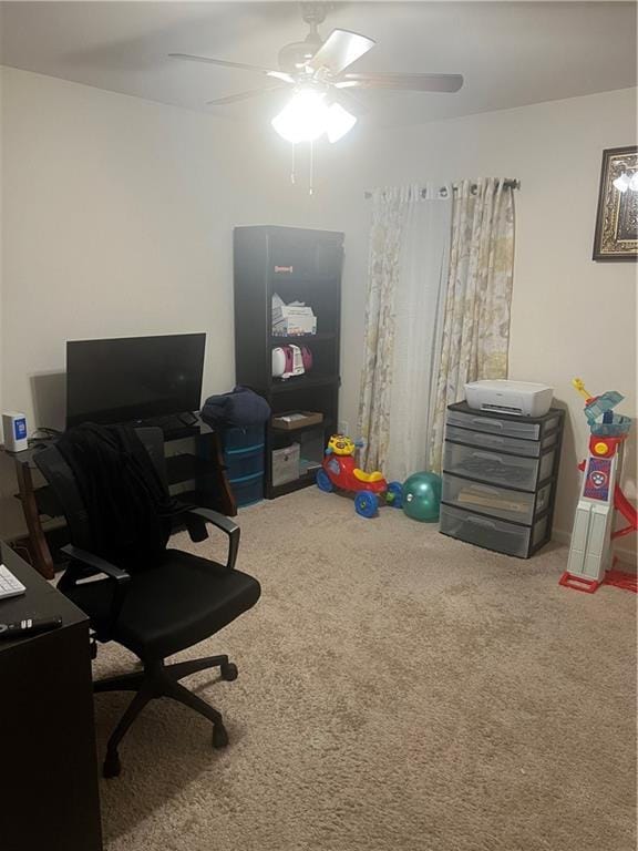 office with ceiling fan and carpet flooring