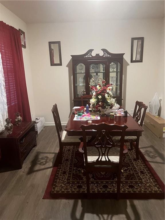 dining room featuring dark hardwood / wood-style flooring