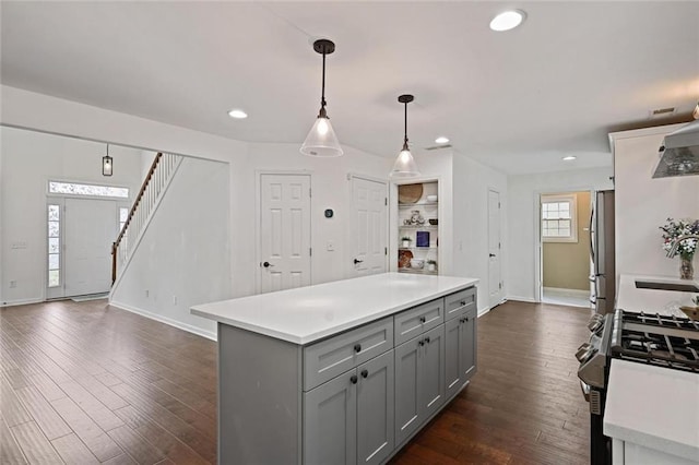 2983 Albright Commons NW, Kennesaw, GA 30144 - kitchen with gray cabinetry, stainless steel appliances, light countertops, dark wood-style flooring, and recessed lighting