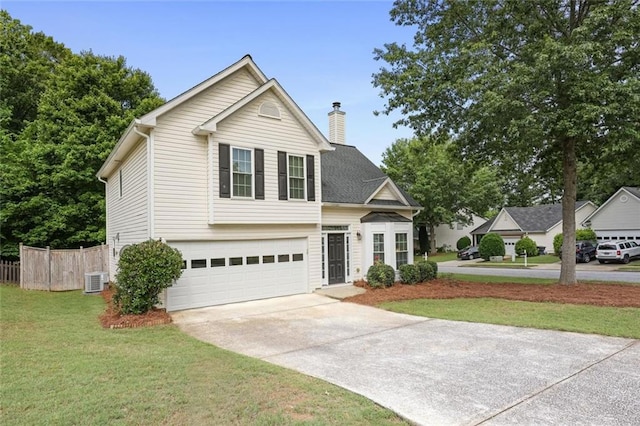 2983 Albright Commons NW, Kennesaw, GA 30144 - traditional-style house featuring concrete driveway, an attached garage, and a chimney