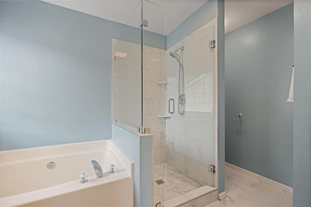 2983 Albright Commons NW, Kennesaw, GA 30144 - full bath featuring a bath, a stall shower, and marble look tiles