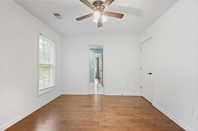 2983 Albright Commons NW, Kennesaw, GA 30144 - unfurnished room with ceiling fan and wood finished floors