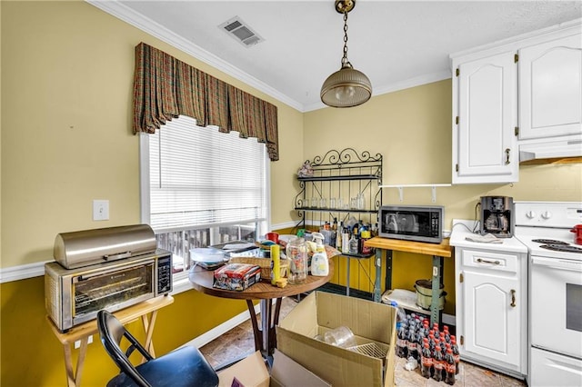 kitchen featuring white range with electric stovetop, visible vents, stainless steel microwave, light countertops, and white cabinetry