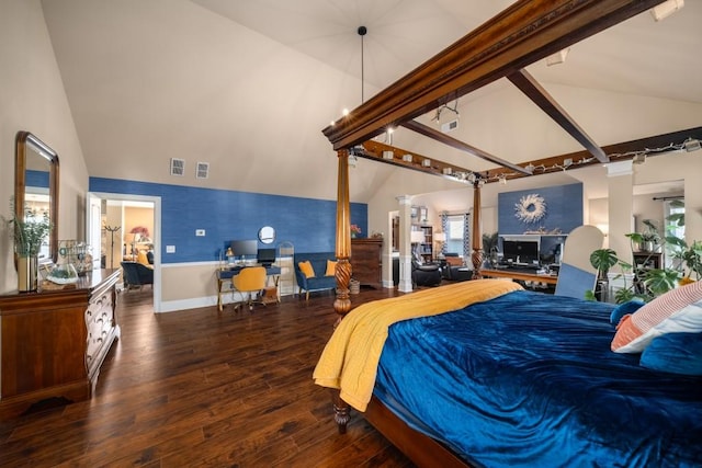 bedroom with high vaulted ceiling, wood finished floors, visible vents, and ornate columns