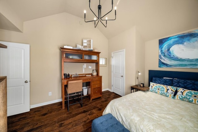 bedroom with dark wood-type flooring, lofted ceiling, a chandelier, and baseboards