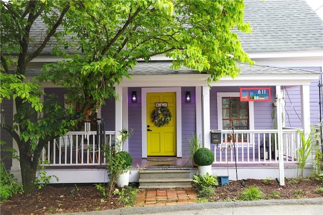 611 Pickett St SE, Atlanta, GA 30316 - property entrance featuring a shingled roof and a porch