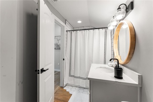 611 Pickett St SE, Atlanta, GA 30316 - bathroom featuring vanity, recessed lighting, wood finished floors, and a shower with shower curtain