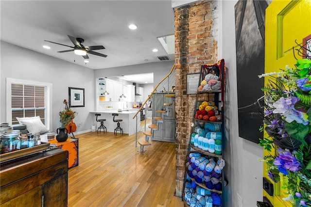 611 Pickett St SE, Atlanta, GA 30316 - living area with stairs, ceiling fan, light wood-style floors, recessed lighting, and baseboards