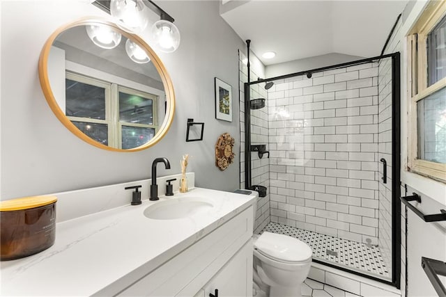 611 Pickett St SE, Atlanta, GA 30316 - bathroom featuring a stall shower, vanity, toilet, and vaulted ceiling