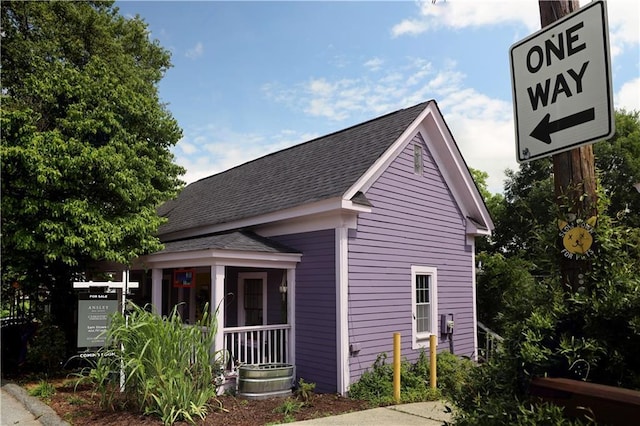 611 Pickett St SE, Atlanta, GA 30316 - view of home's exterior featuring a shingled roof and covered porch